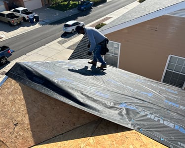 a man installing a home roof