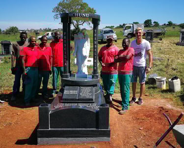 The Tegg's team with a custom memorial manufactured by TGM
