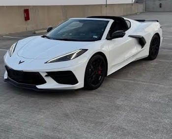 Rear view of 2023 Corvette 3LT with white paint and black trim