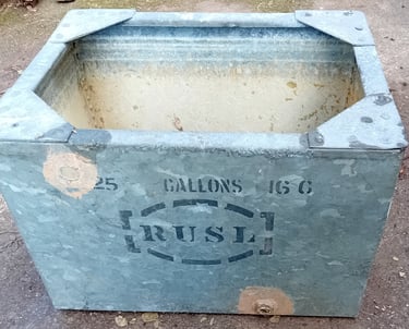 Old rectangular galvanised steel cold water tank