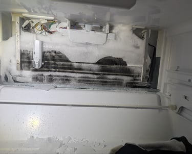 whirlpool refrigerator not cooling properly
