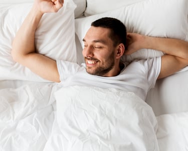Man sleeping after using a top massage gun