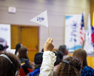 a person holding a flag of Prife Colombia Stockist