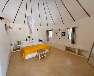 Vue intérieure d'une chambre classique du boutique hotel Maison Fimela situé dans le Sine Saloum