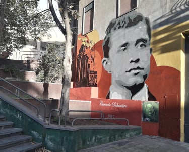 Mural dedicated to Carmelo Salanitro, created by Poliops on an urban wall, a historical commemorativ