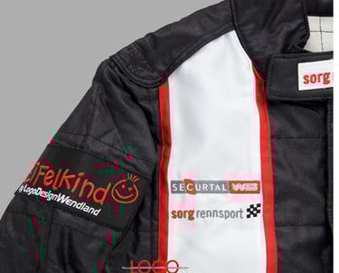 a jacket with a logo on it and a tag on the back of it