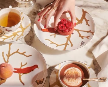 Luxury tea service with desserts at Le Meurice in Paris.