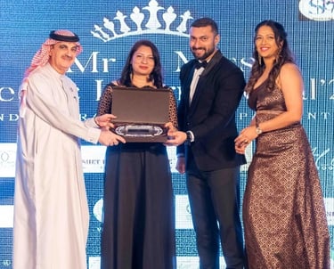 Priya fashions designer Priya Fernandes receiving award
