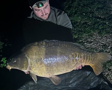 a man holding a fish carp carp carp carp