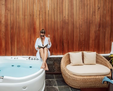 Suite with outdoor jacuzzi area at Villa Escalesia Galapagos, offering a private relaxation space wi