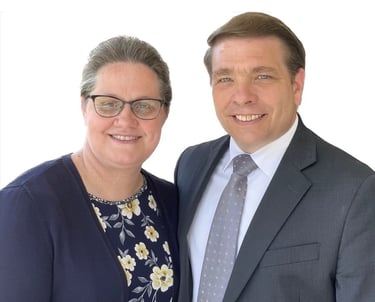 a man and woman standing next to each other