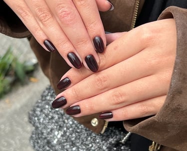 a woman's hands with a manicured manicured manicured manicured mani