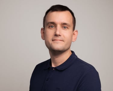 a man in a blue shirt and a white shirt