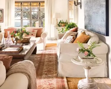 Living room with beams and garden views at Finca Santa Katerina