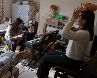 Photo1 – student participating in music lesson