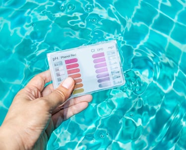 Water chemistry testing strip kit used to ensure healthy pool water balance for residential maintenance clients.