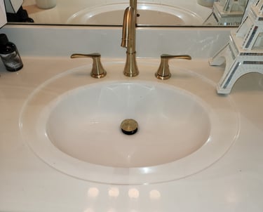 a sink with a sink and a mirror