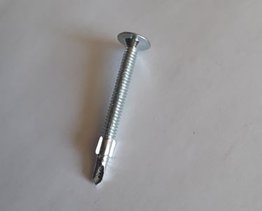 Self-drilling metal screw used in drywall and framing installation for renovation projects