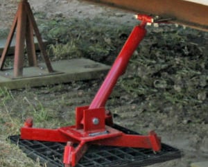 Close-up of Anchor Brace system securing a HUD-code home to ground anchors — approved for California