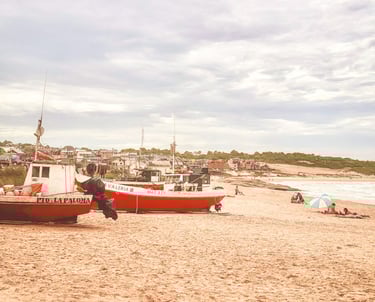Boats on the beach in Punta Del Diablo in Uruguay