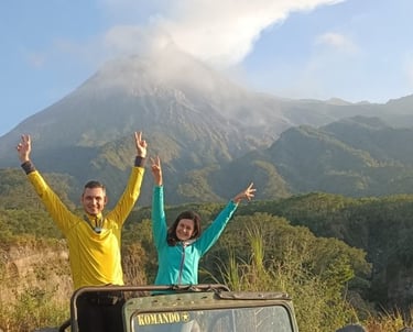 standing on a dirt road with a jeep