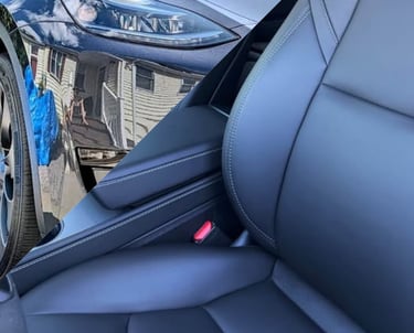 Interior and Exterior of a grey tesla mobile y