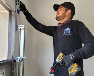 Alejandro upgrading a garage door | On Point Overhead Doors - Kyle, TX