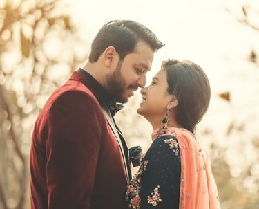 a couple standing next to each other in a tree