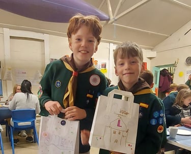 Cub Scouts smiling inside the 25th Allerton Scout Hut in South Liverpool