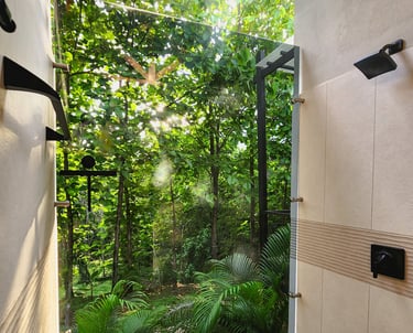 a bathroom with a large window and a view