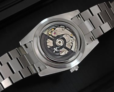 a watch with a metal bracelet