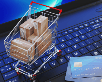 bir alışveriş arabası ve içinde kutular