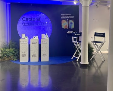 Cetaphil Hydration Lab testing station with products.
