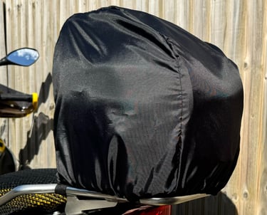 Motorsport helmet snugly secured inside a Remy fleece-lined helmet bag, showcasing soft interior