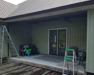 a house with a ladder and ladders