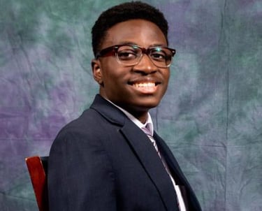 Tayo Alalade In a suit for Tilver