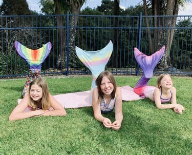 three Mermaids at a Merventure Mermaid class