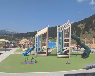 a playground with a slider and a slider