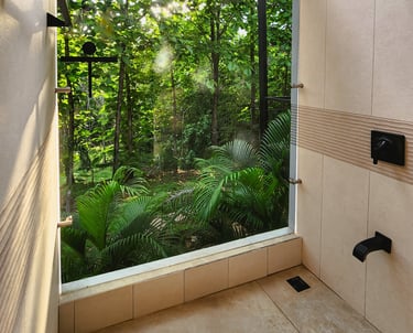 a bathroom with a large window and a view