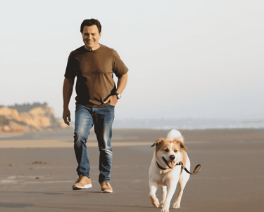 Man and dog on the beach