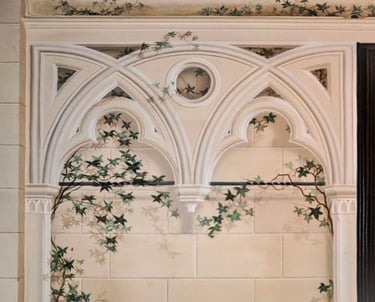 Painted trompe l'oeil gothic arch in a sandstone finish, complete with sandstone blocks in the background and ivy vines.