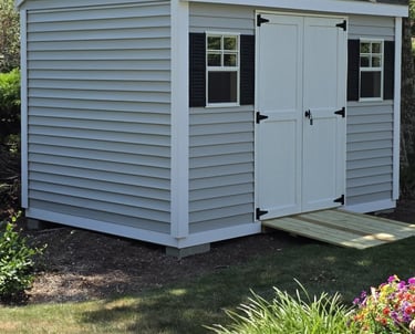 Decorative frieze bottom trim on custom shed built in Massachusetts, enhancing shed appearance with elegant finishing detail.