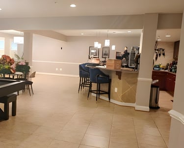 Before image of plain basement without charm - outdated flooring, bare walls, and minimal character