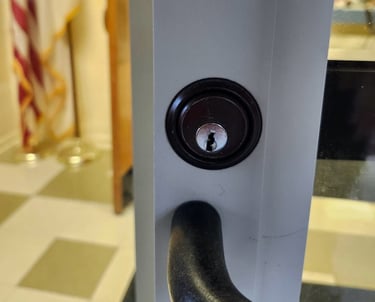 Close up of black lock on a business door representing inexpensive local locksmith of Mars Hill commercial services