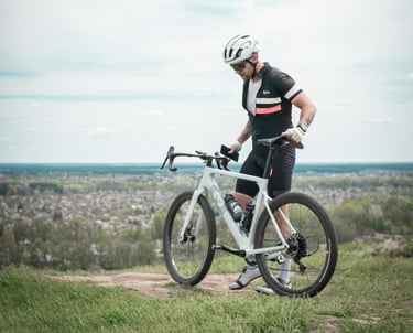 a man presenting his bike