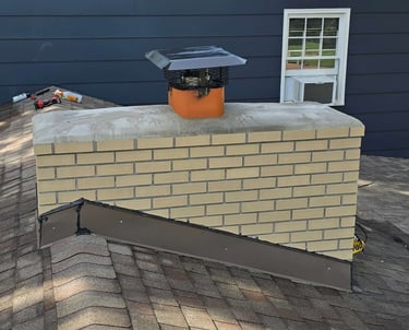 "Custom brick chimney built by Profaster Services in Des Moines."