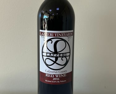 A close up picture of a wine bottle labeled 2016 Red Wine