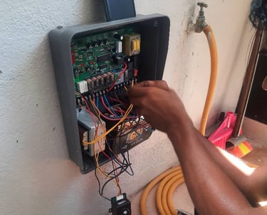 Suasana Electrical installing circuit breakers, wiring, and DB box safety.