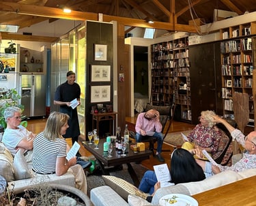 a group of people sitting around a table