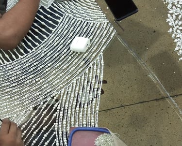 Hand beaded dress by artisan